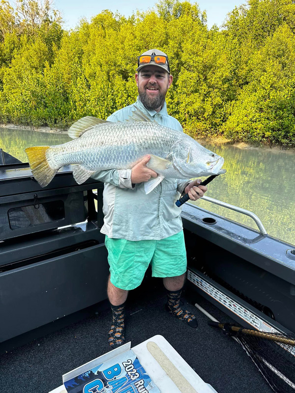 man holding fish