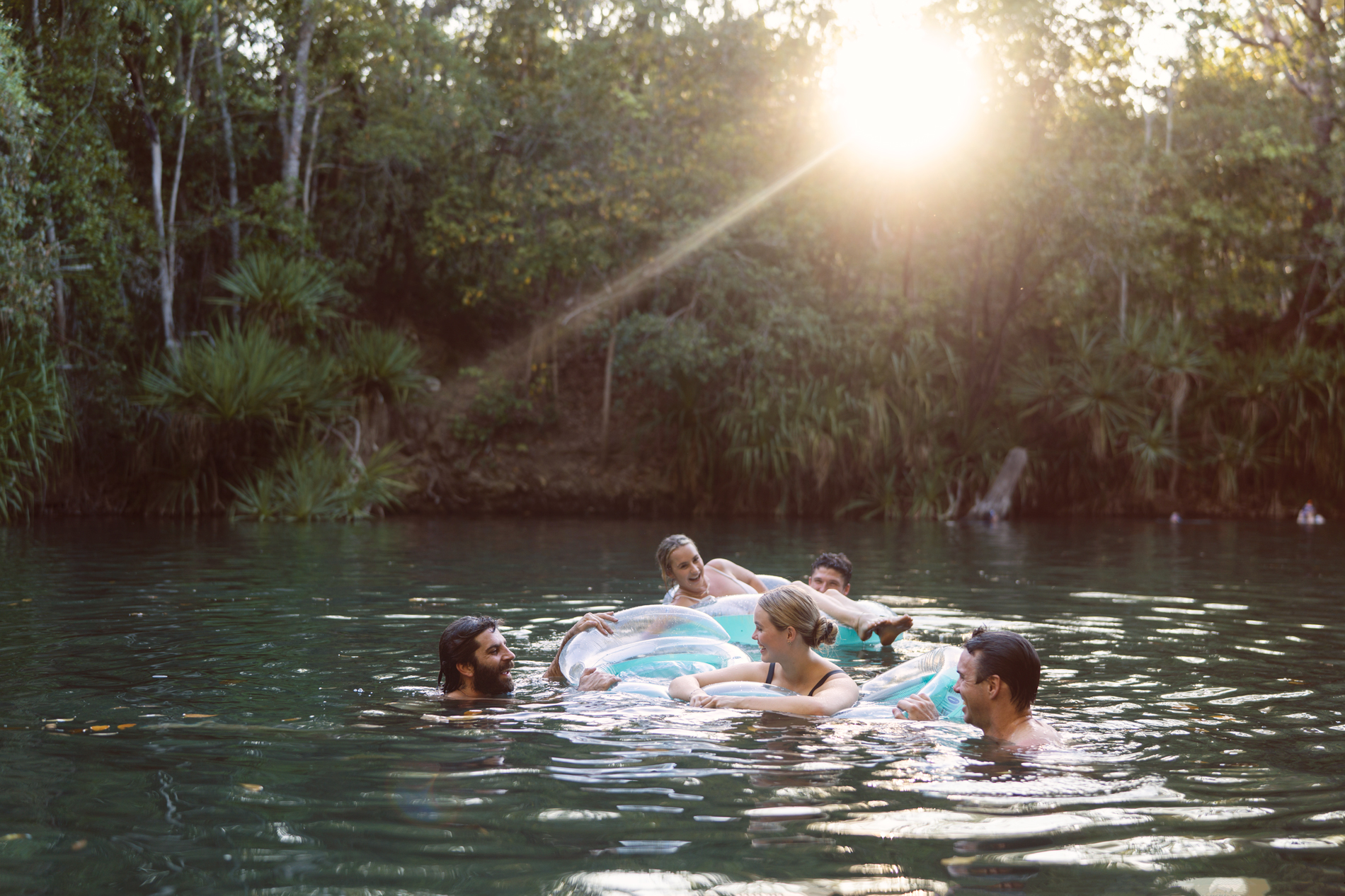 Friends swimming at Berry Springs Nature Park in the Northern Territory