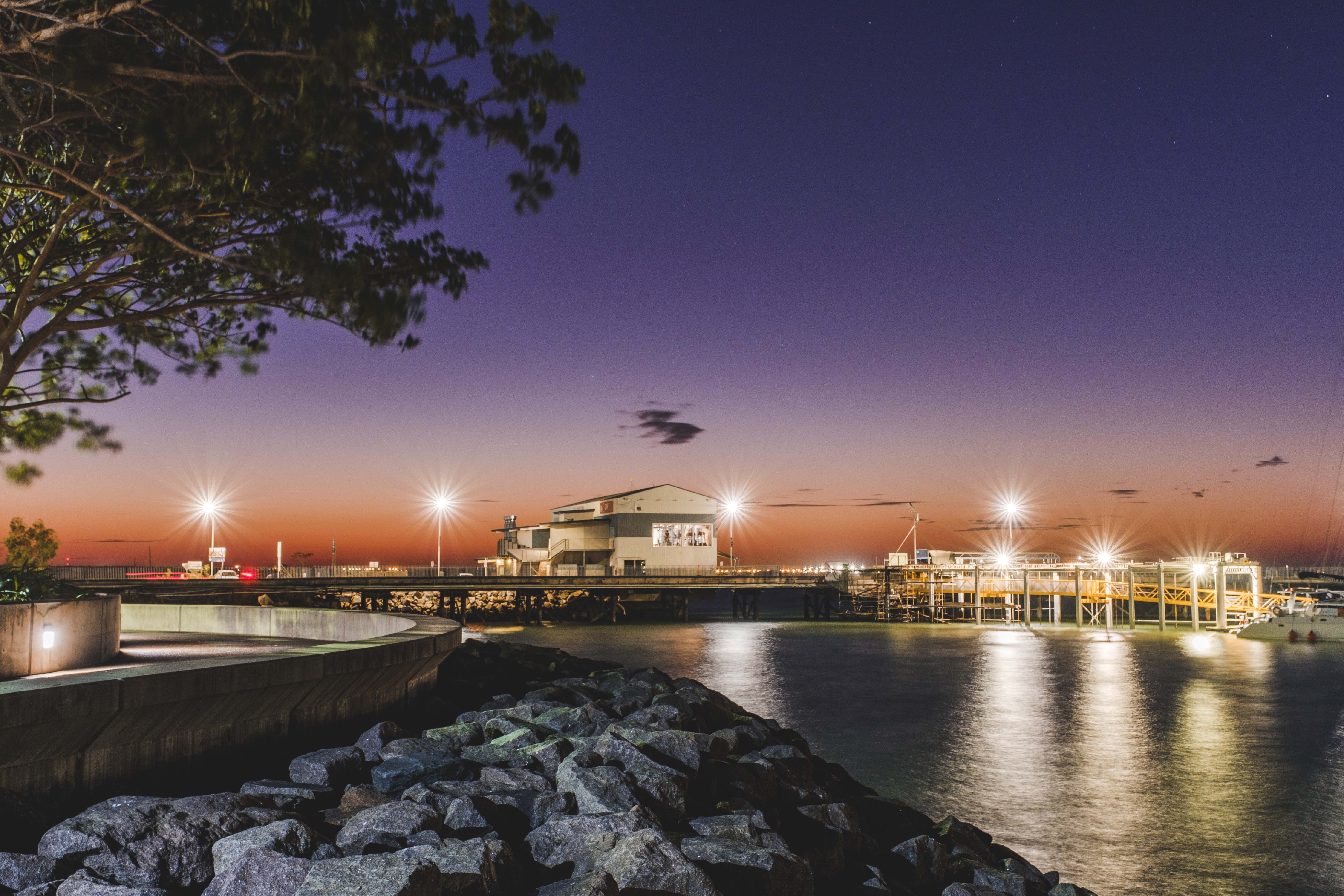 Sunset over stokes hill wharf darwin waterfront