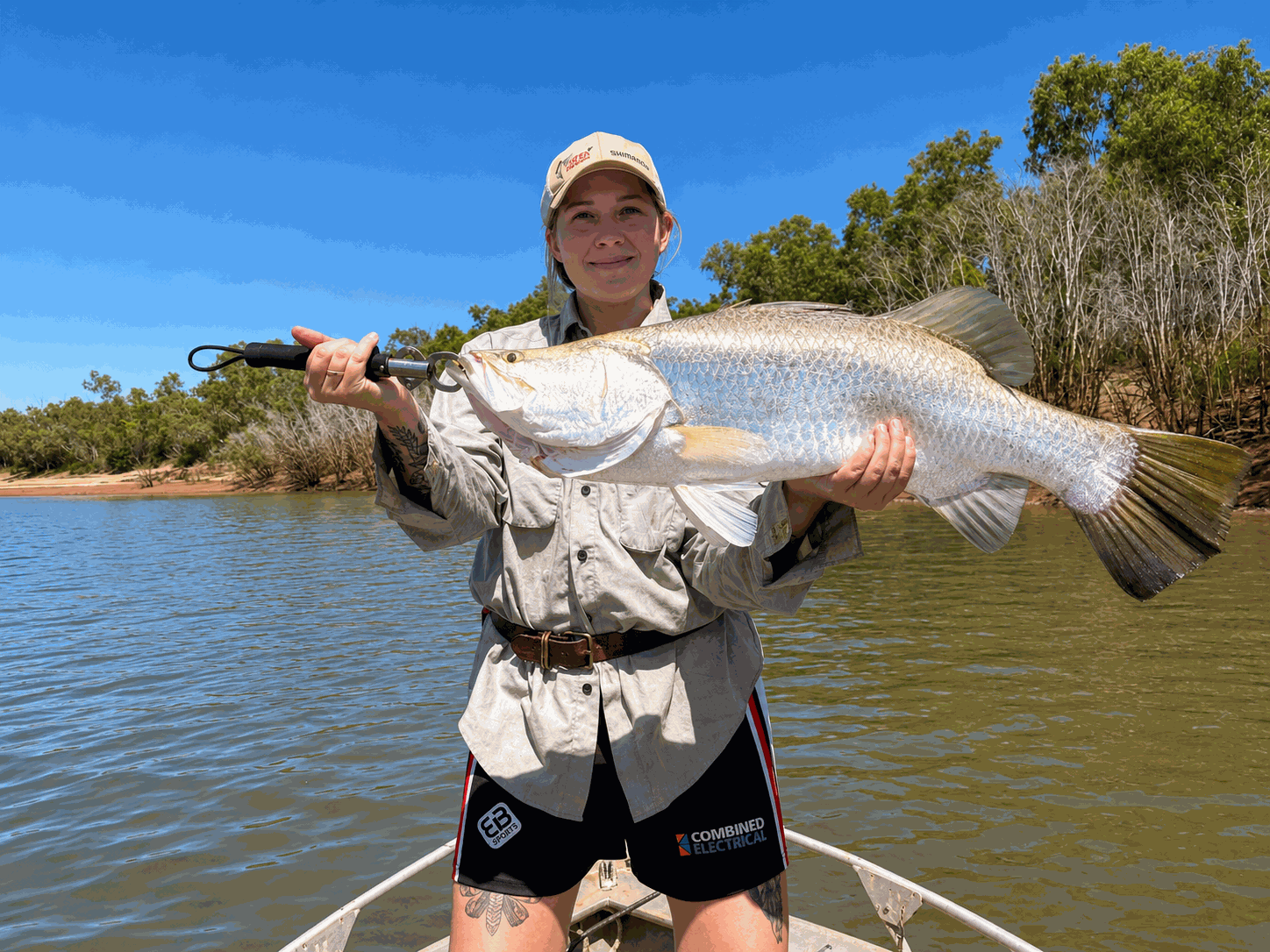 Person holding a fish