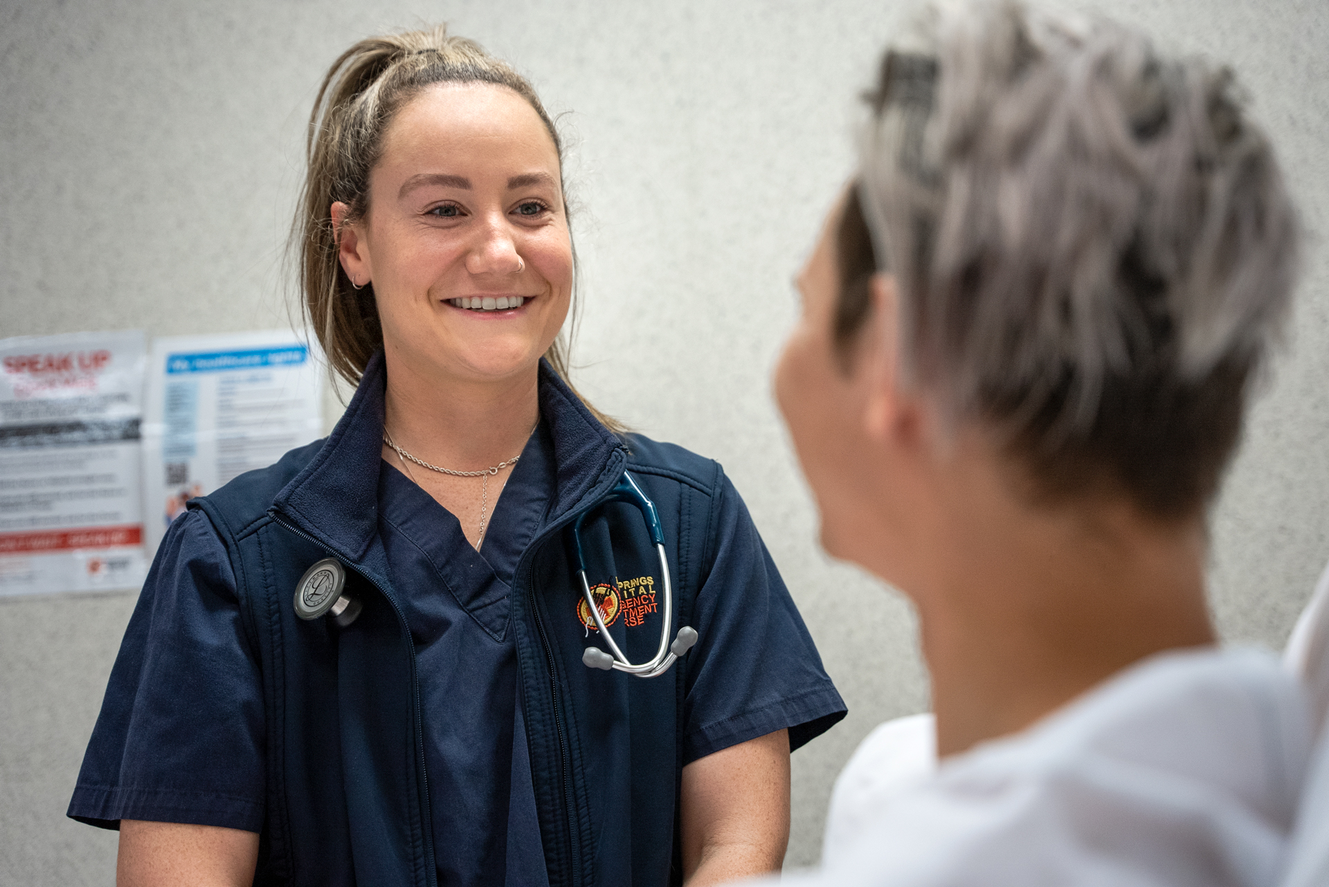 Nurse speaking with a patient
