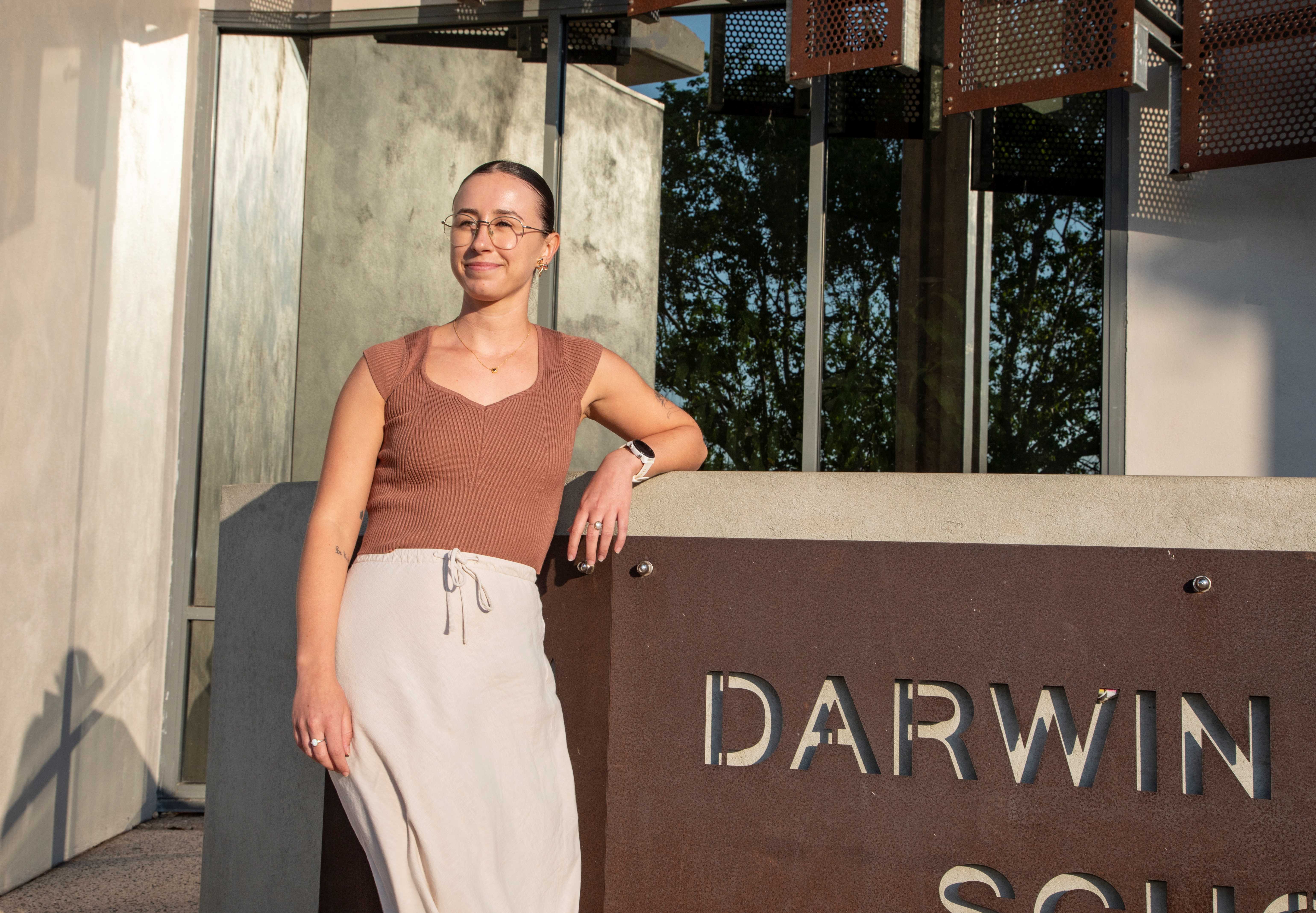 Danica Winterton with Darwin sign