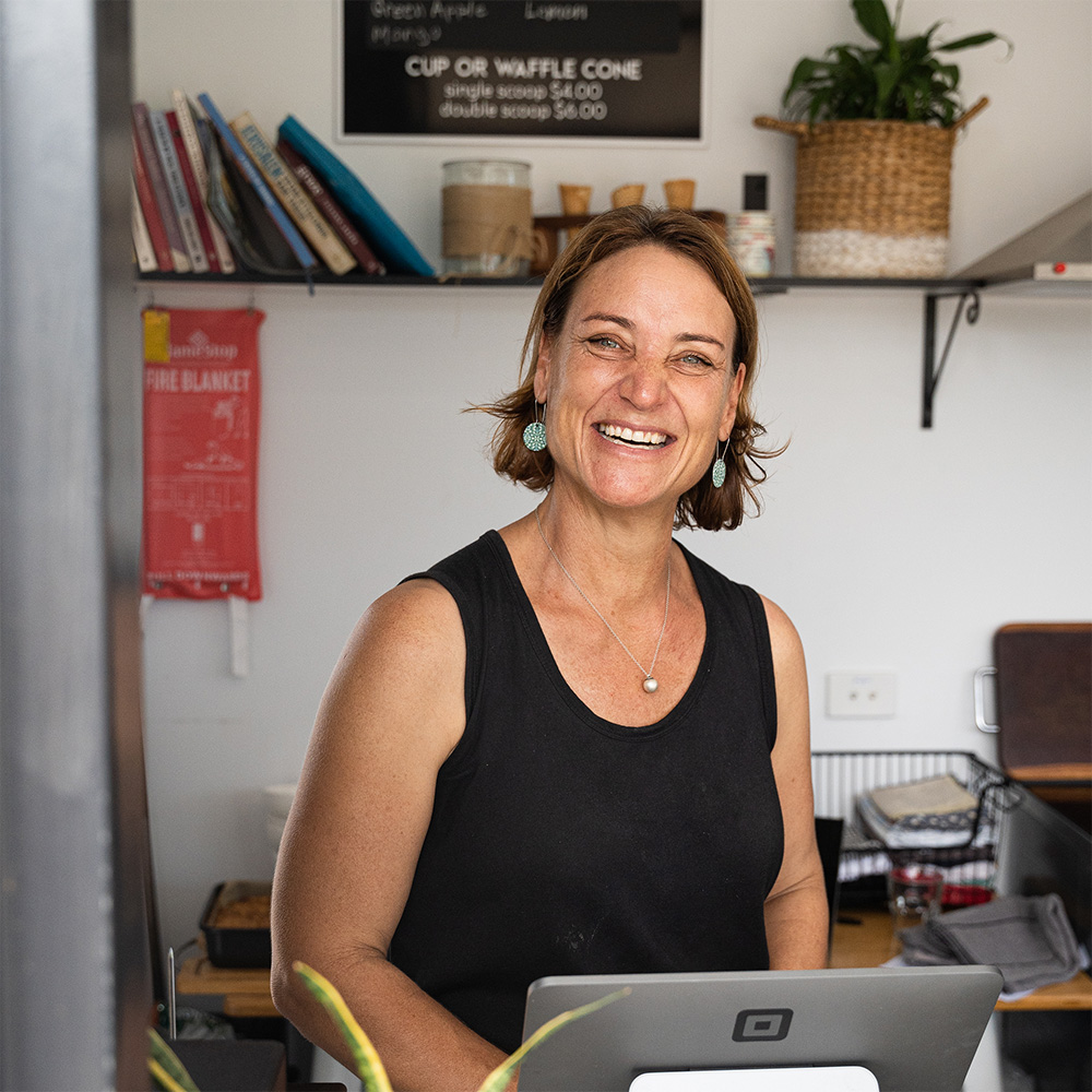 Lady smiling the Meeting Place Cafe