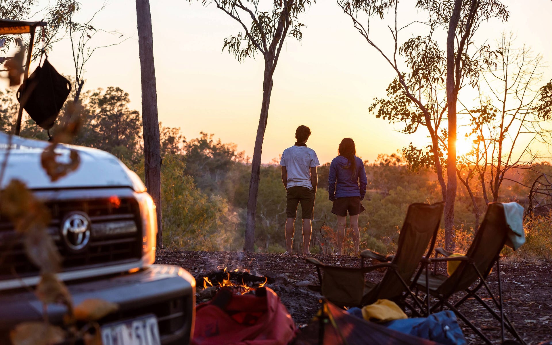 Couple_looking_at_the_sunset_together_while_camping_near_Butterfly_Gorge