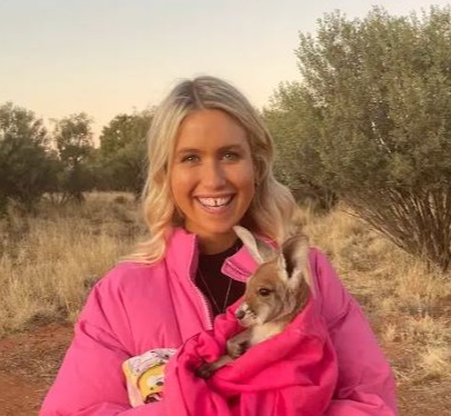 women holding kangaroo