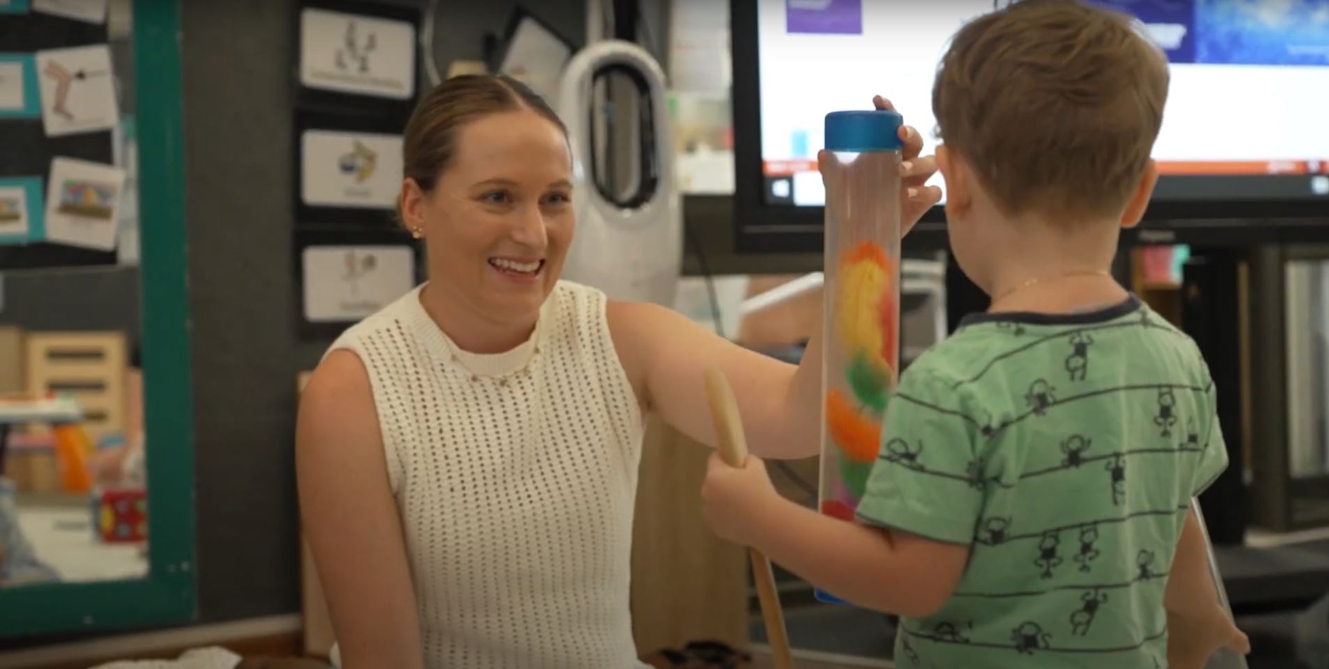 Occ Therapist with kid - still from Education YT