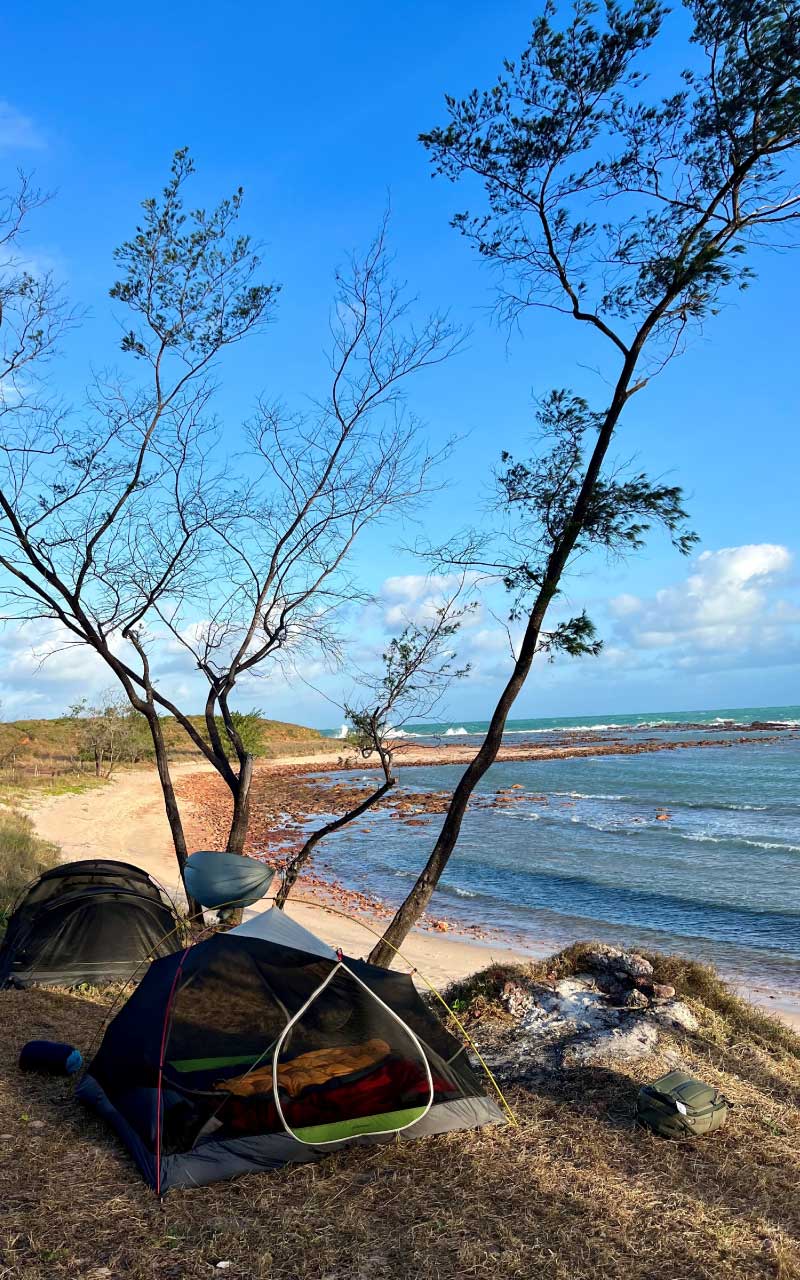 Tents and camping site at remote beach