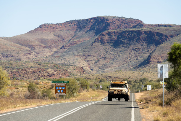 Vehicle driving through Larapinta, NT