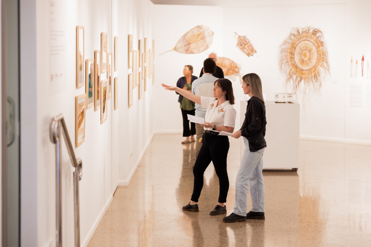 Two ladies viewing art at Godinymayin Art Gallery in Katherine Northern Territory