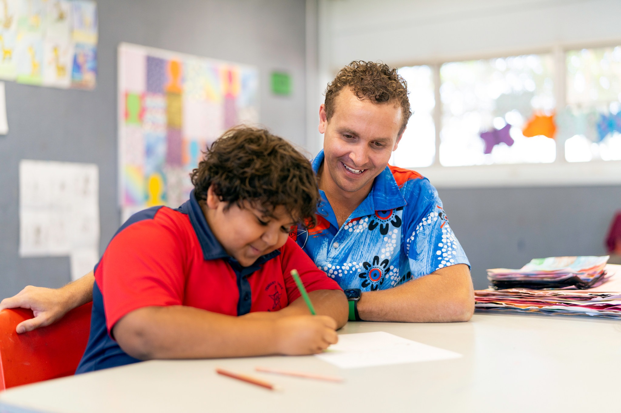 Teacher and student in class