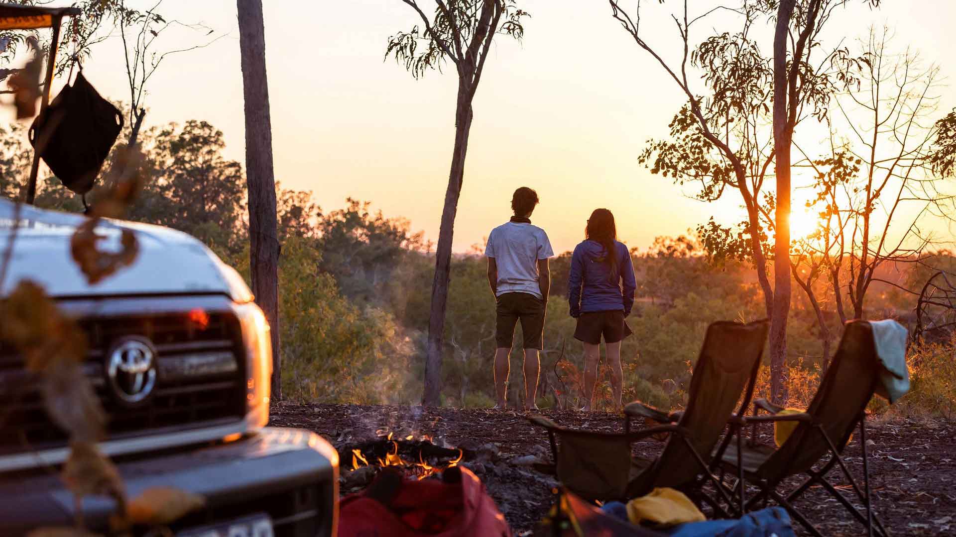 Couple_looking_at_the_sunset_together_while_camping_near_Butterfly_Gorge