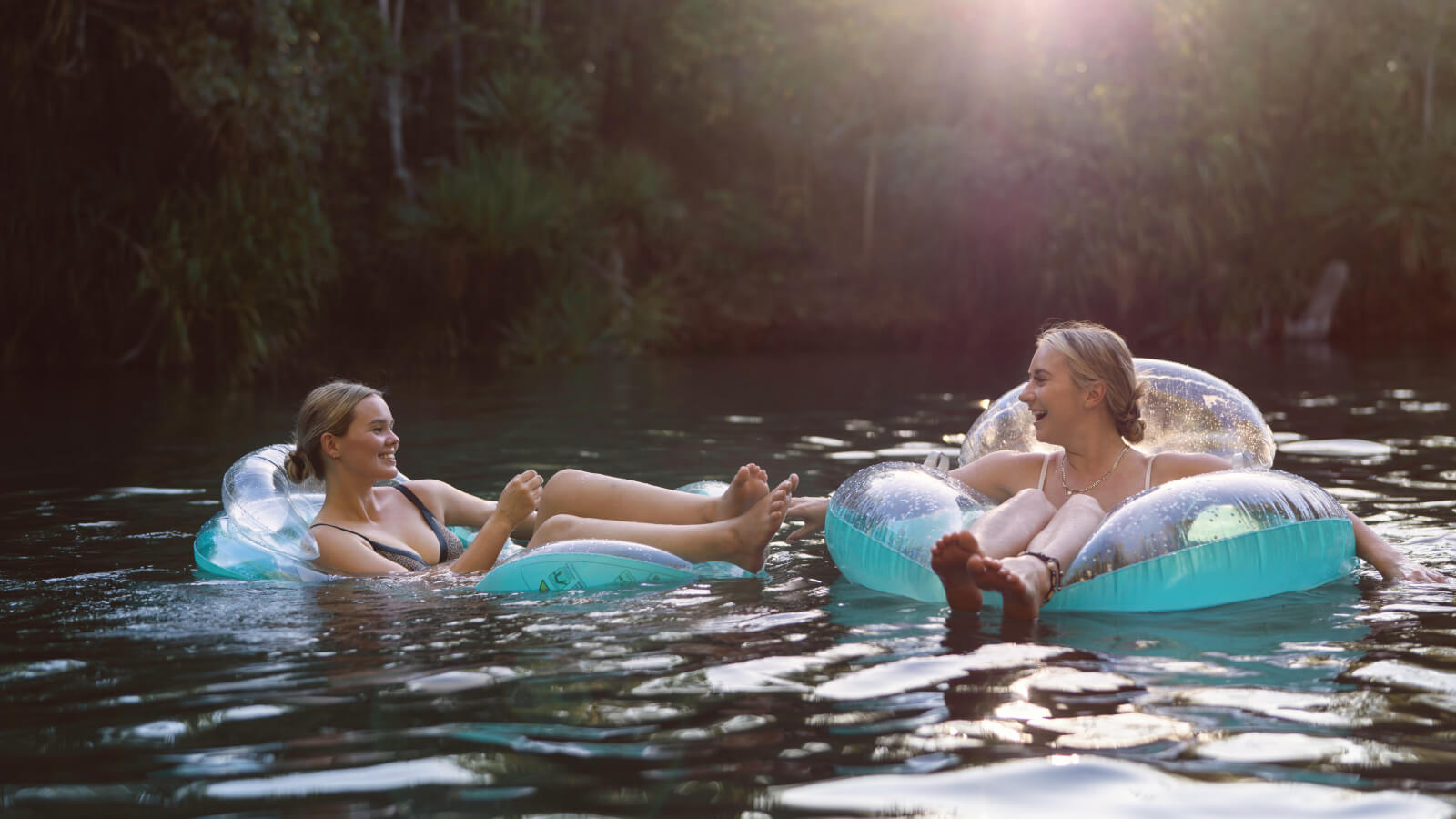 People floating in Berry Springs water Northern Territory Australia