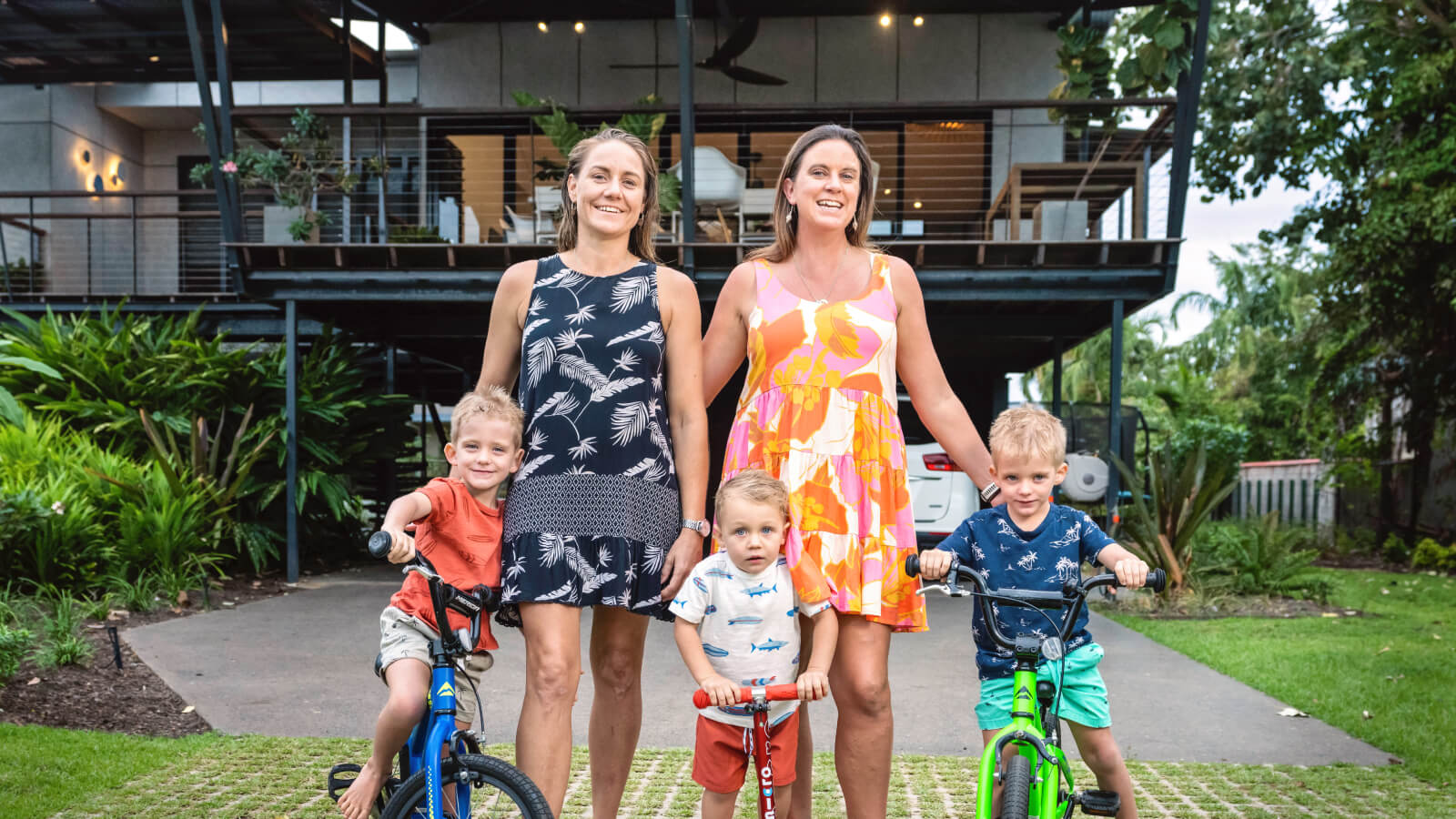 Family group photo in front of house