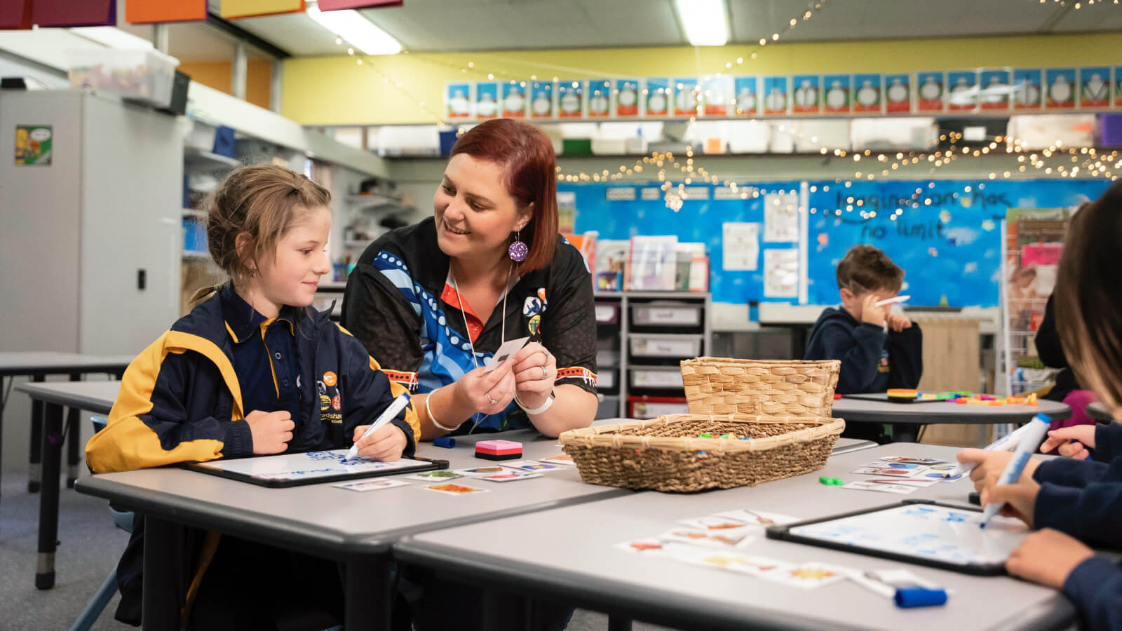 Teacher helping a student